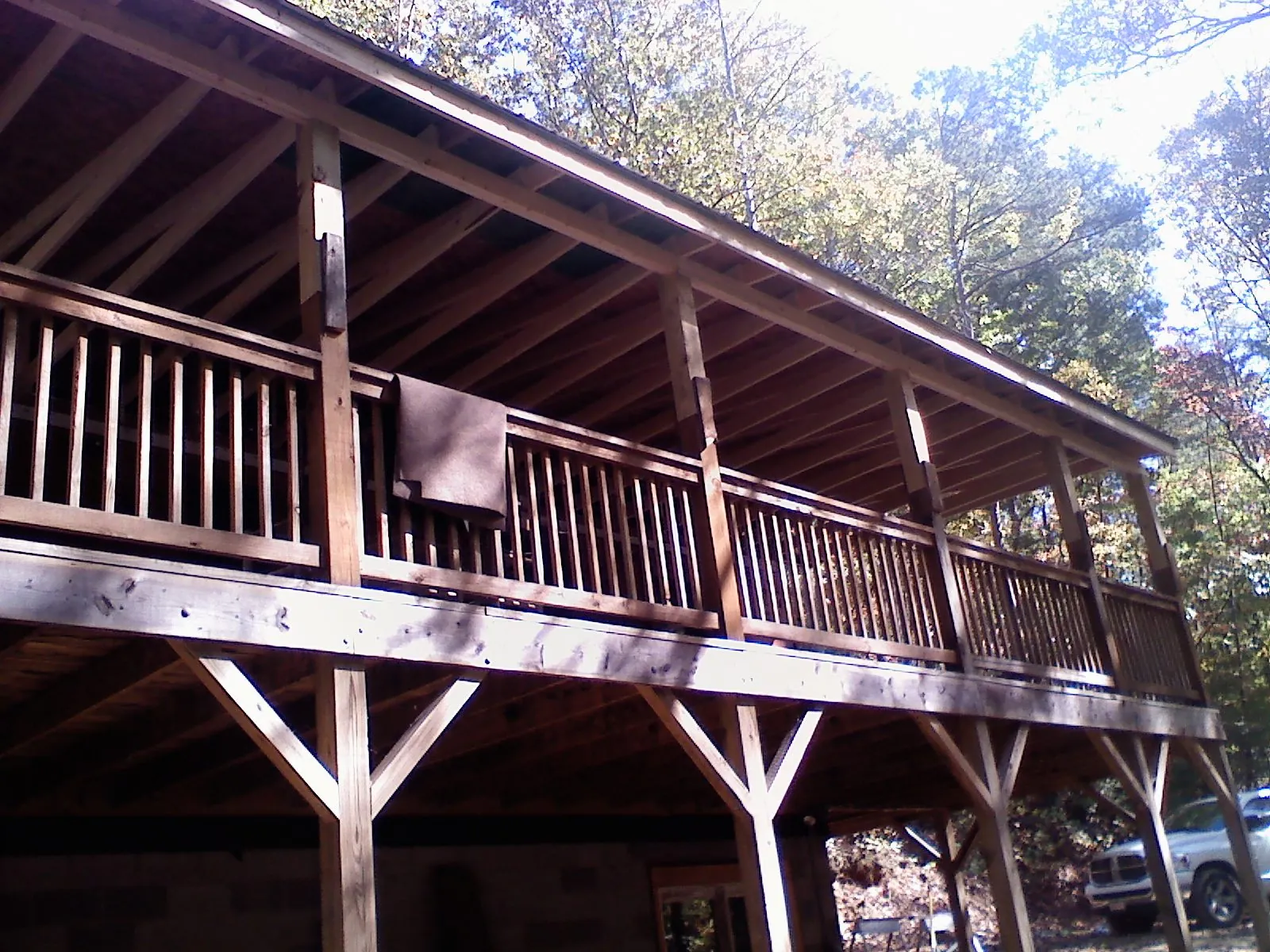 Timber framing under a new elevated porch and deck — Roof Leak Repair in Bridgehampton by Roofing Brothers